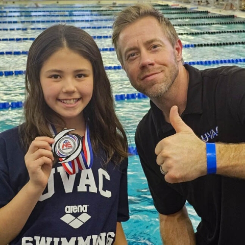 UVAC Swimmer Saya Brown and Coach Pat Foley at the 2025 10 And Under Championship Meet